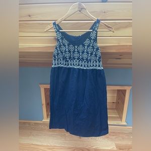 Blue dress with white embroidery